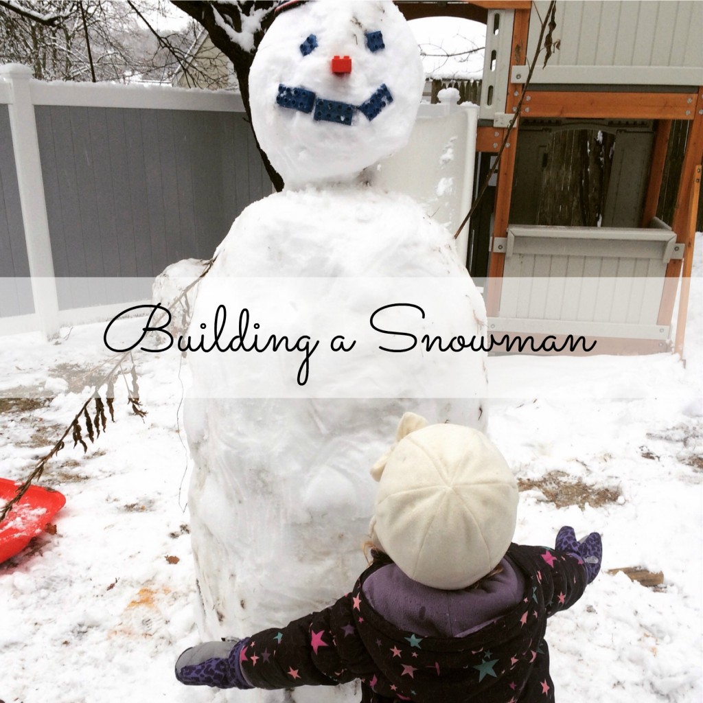 Country Kids Building a Snowman