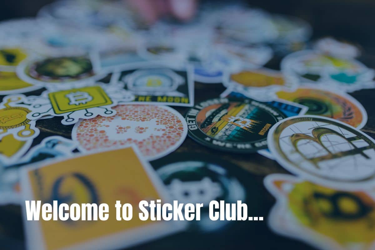 Welcome to Sticker Club, image of lots of colorful stickers laid out on a table. 