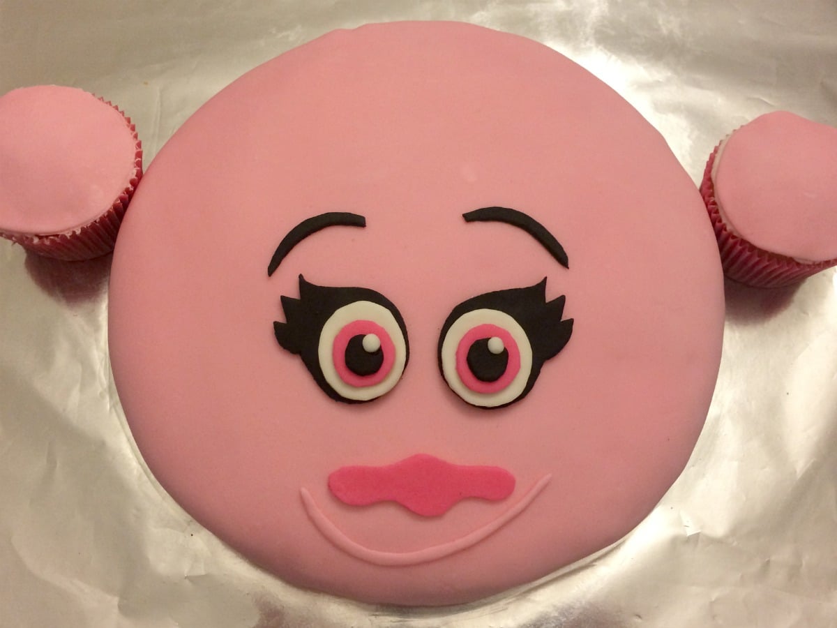 How to make a Princess Poppy cake with pull-apart cupcake hair: step by step tutorial to make a Trolls Princess Poppy Cake